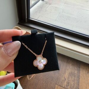 Van Cleef & Arpels pink mother of pearl holiday pendant 2025